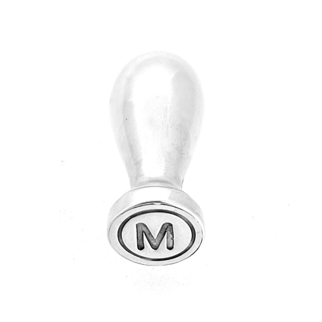Small Sampson Mordan silver wax seal shown from the side