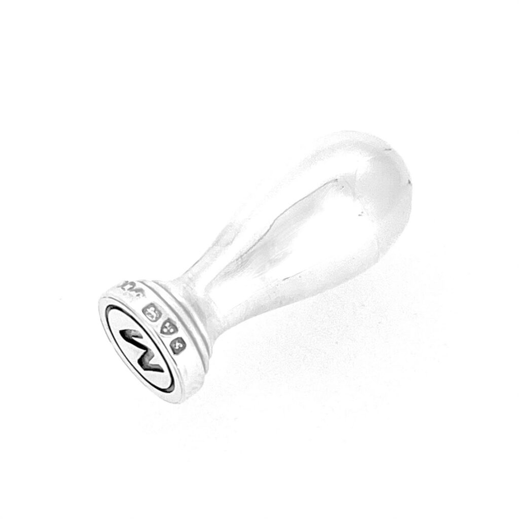 Antique letter M seal with circular silver face