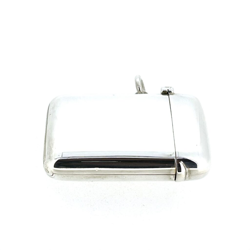 Close view of the sprung lid and hinge on the Sampson Mordan vesta case