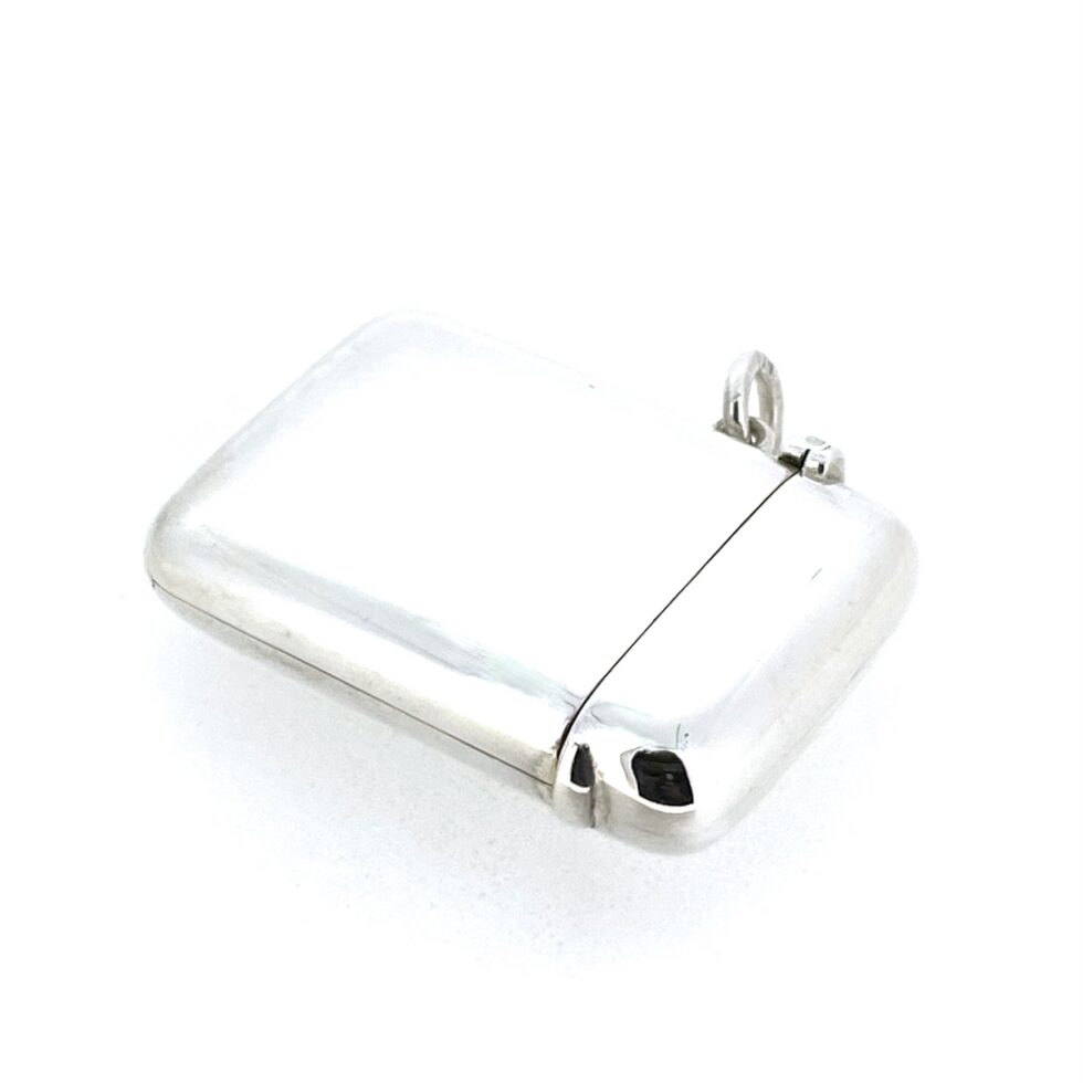 Closed Edwardian silver vesta case by S Mordan and Co with rounded polished exterior